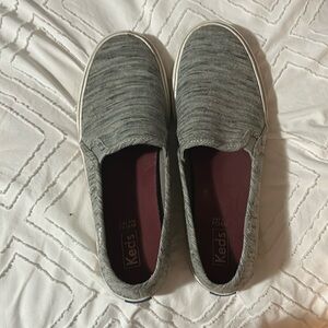 Grey keds slip on